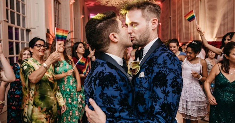 Ben Cohen and husband Anthony James share a kiss at their wedding