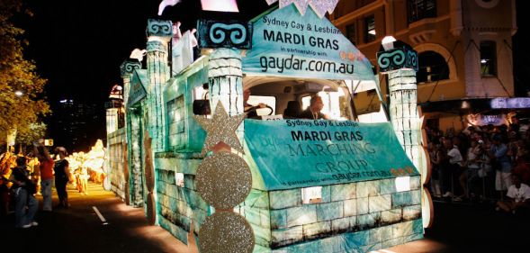 The Gaydar float makes its way along Oxford Street during the 2007 Sydney Gay and Lesbian Mardi Gras parade March 3, 2007 in Sydney, Australia. The float is bright and well lit against the dark background of the street, and looks like an ancient roman temple
