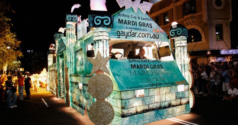 The Gaydar float makes its way along Oxford Street during the 2007 Sydney Gay and Lesbian Mardi Gras parade March 3, 2007 in Sydney, Australia. The float is bright and well lit against the dark background of the street, and looks like an ancient roman temple