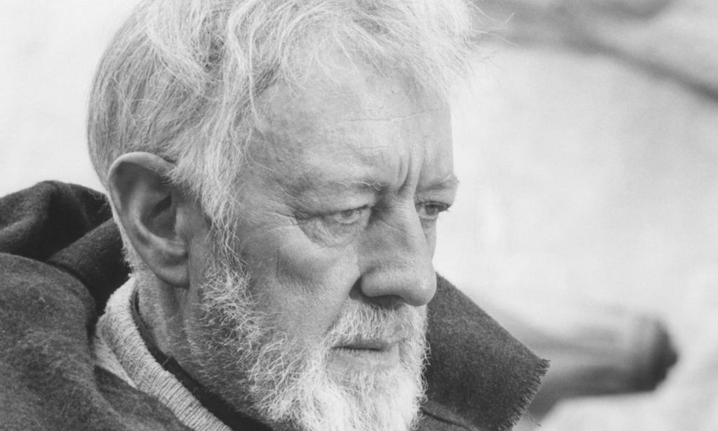 This is a black and white photo still taken from the Stars Movie. It is of Alec Guiness portraying Obi-wan Kenobe.