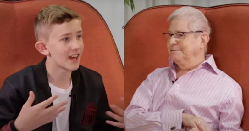 78-year-old Percy (right) and 13-year-old Louis (left) on an orange sofa talking about how they each experienced growing up and living as gay.