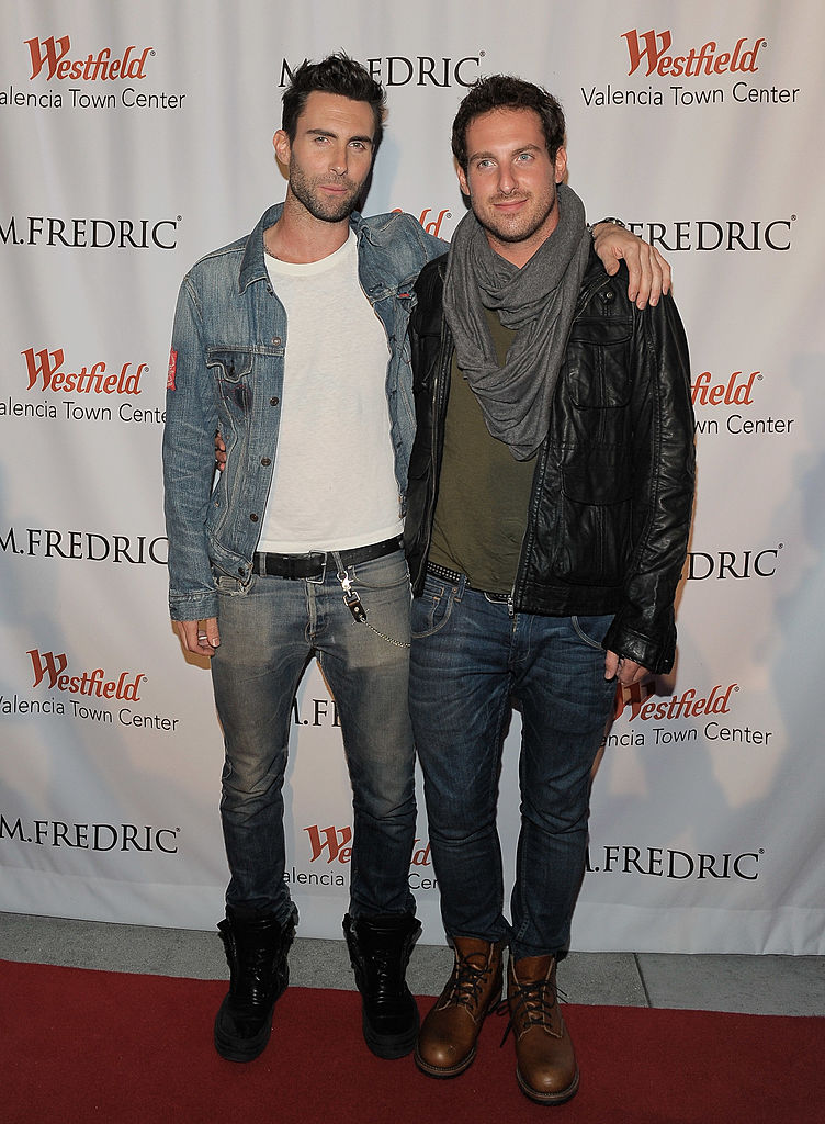 Adam Levine (left) on a red carpet with brother Michael (right) 