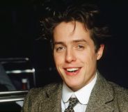 Close-up of British actor Hugh Grant (in costume as Clive Durham) during the filming of 'Maurice' (directed by James Ivory), London, England, December 1986.