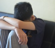 A sad boy, representing 13-year-old boy who was abused on Grindr