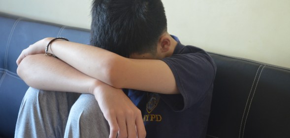 A sad boy, representing 13-year-old boy who was abused on Grindr