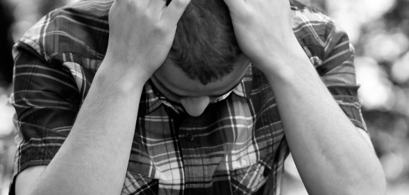 A man representing domestic abuse statistics in same-sex relationships