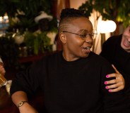 A transmasculine person with a friend at the bar. (The Gender Spectrum Collection/Broadly)