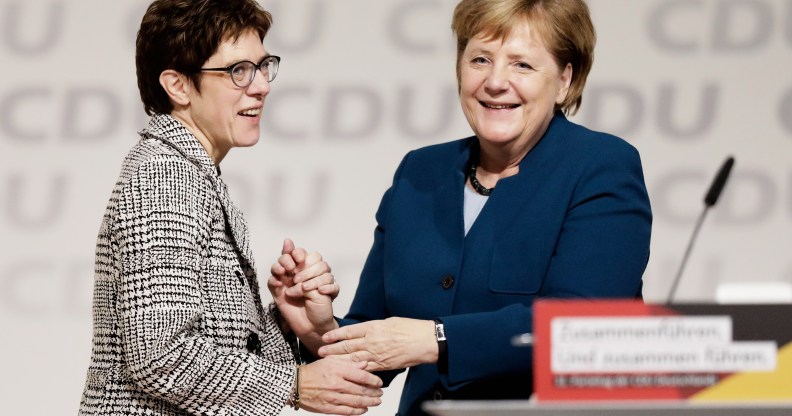 Annegret Kramp-Karrenbauer is congratulated by Angela Merkel after receiving the most votes to become the next leader of the German Christian Democrats (CDU) at a federal congress of the CDU on December 7, 2018 in Hamburg, Germany.