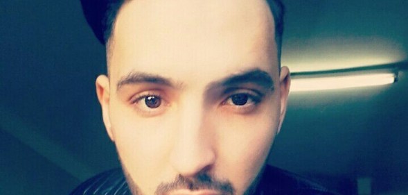 Assil Belalta, who had his throat cut and "gay" smeared in blood on the wall in a homophobic murder