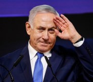 Benjamin Netanyahu saluting