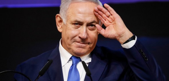 Benjamin Netanyahu saluting