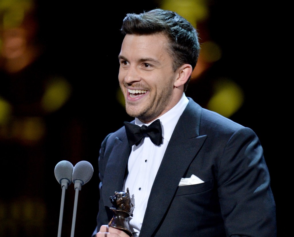 Jonny Bailey, winner of the Best Actor In A Supporting Role In A Musical award for 'Company', on stage during The Olivier Awards 2019 with Mastercard at the Royal Albert Hall on April 07, 2019 in London, England.