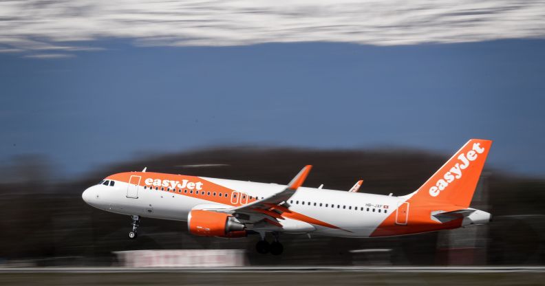An EasyJet Airbus A320 commercial plane with registration HB-JXF is landing at Geneva Airport on March 22, 2019 in Geneva.