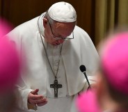 Pope Francis prays during the opening of summit on clerical sex abuse.