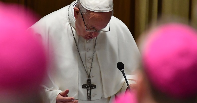 Pope Francis prays during the opening of summit on clerical sex abuse.