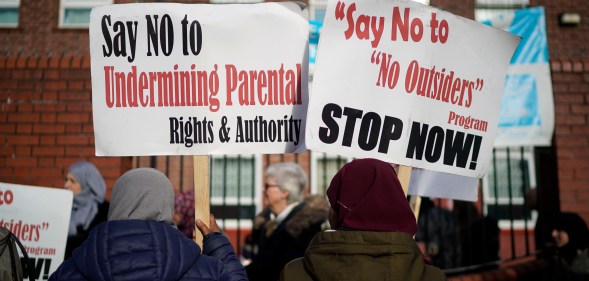 Parents and protestors demonstrate against 'No Outsiders,' an LGBT relationships education.