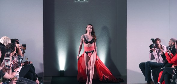 Carmen Liu walks the runway during the launch of the World's First Transgender Lingerie Brand 'GI Collection' at Glaziers Hall on February 28, 2019 in London, England.