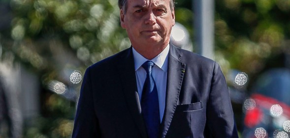 Brazilian President Jair Bolsonaro walks during a ceremony to mark the Army Day, in Sao Paulo, Brazil, on April 18, 2019.