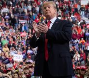 US President Donald Trump claps as he leaves after speaking during a Make America Great Again rally in Green Bay, Wisconsin, April 27, 2019