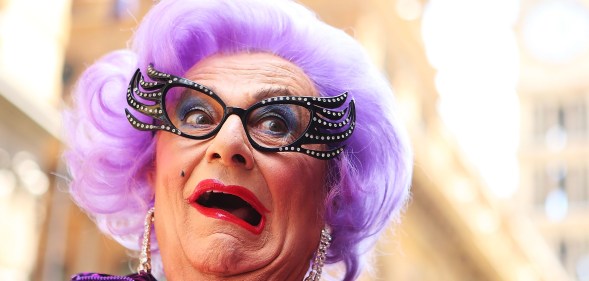 Dame Edna participates with her fans in a Zumba fitness class at Martin Place on January 15, 2013 in Sydney, Australia.
