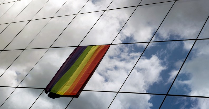 A rainbow flag is displayed on the building of European Council Office.