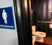 Picture of a gender neutral bathroom sign, which an Indiana bill would ban forcing trans students to use facilities matching their sex at birth.