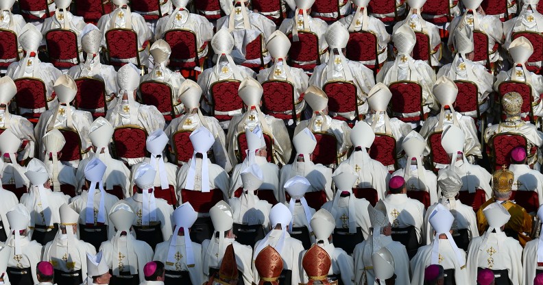 Vatican bishops and cardinals who, according to a new book, are for the most part gay, attend mass.