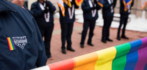 Bisexual veterans are among Marchers representing OutVets, a group for LGBTQ veterans.