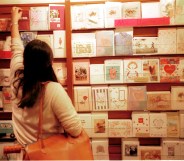 Cards buyer looks over Mother's Day cards.
