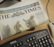 In this photo illustration a copy of The Times newspaper rests on a computer on August 7, 2009 in London.