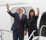 US Vice-President Mike Pence and his wife Karen Pence wave upon landing at a military air base in Brasilia June 26, 2018.