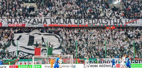 The banner displayed by Legia Warsaw fans at its Polish Army stadium