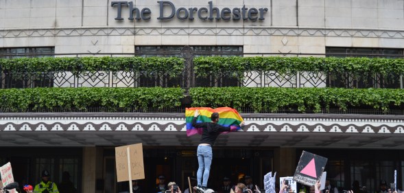 Protest outside The Dorchester hotel in London opposes death penalty for gay sex introduced by Brunei.
