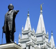 Gay activists gather at Mormon temple for a "kiss in"