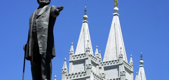 Gay activists gather at Mormon temple for a "kiss in"