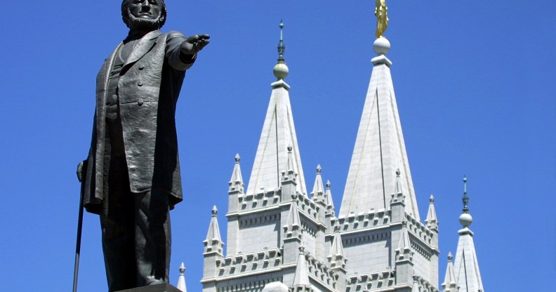 Gay activists gather at Mormon temple for a "kiss in"