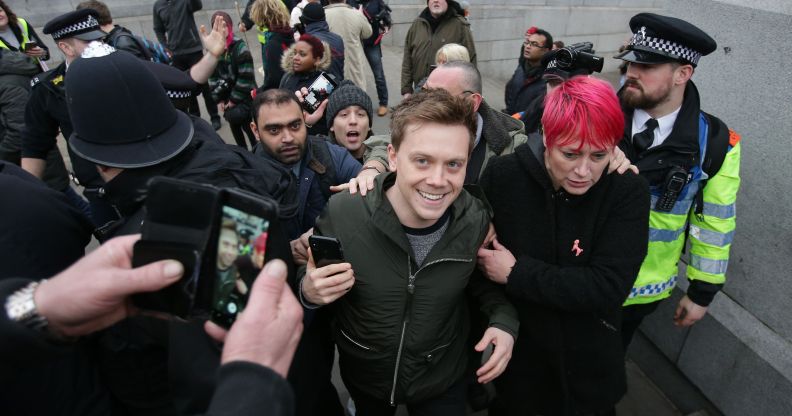 Guardian journalist Owen Jones is confronted by protesters in central London