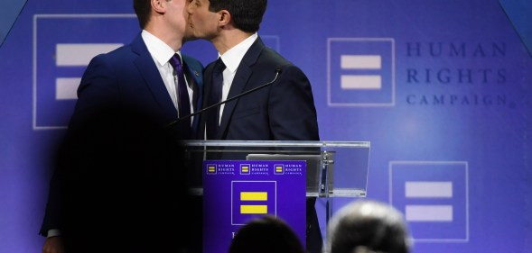 Chasten Glezman Buttigieg kisses his husband, South Bend, Indiana Mayor Pete Buttigieg, after he delivered a keynote address at the Human Rights Campaign's (HRC) 14th annual Las Vegas Gala at Caesars Palace on May 11, 2019 in Las Vegas, Nevada.