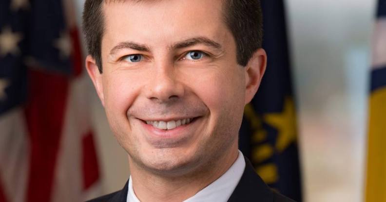 Pete Buttigieg holding a microphone