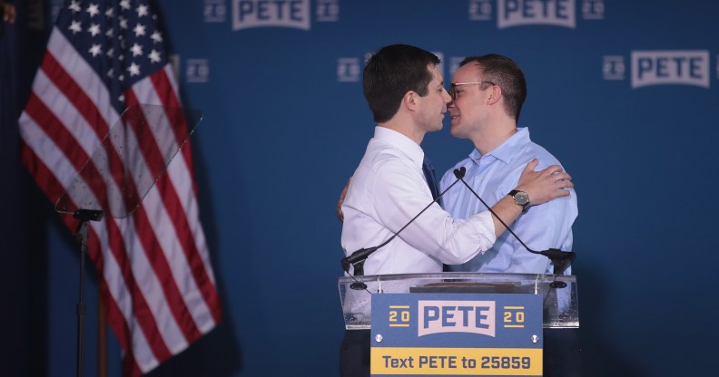 South Bend Mayor Pete Buttigieg greets his husband Chasten after announcing that he will be seeking the Democratic nomination for president during a rally in the old Studebaker car factory on April 14, 2019 in South Bend, Indiana.