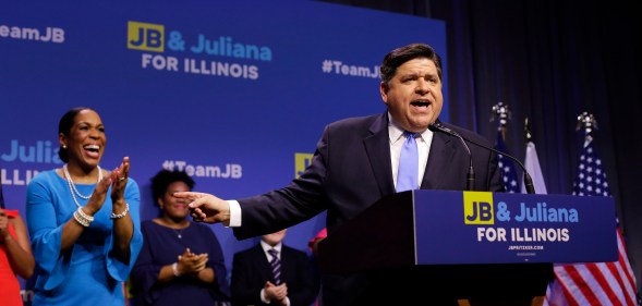 Illinois Democratic candidate for Governor J.B. Pritzker and his Lieutenant Governor pick Juliana Stratton arrive during his primary election night victory speech on March 20, 2018 in Chicago, Illinois.