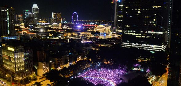 Supporters form a rainbow among lights at the annual Pink Dot event in a public show of support for the LGBT community at Hong Lim Park in Singapore on July 1, 2017.