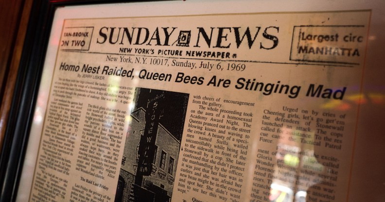 LGBT history: A newspaper from 1969 hangs in New York's Stonewall Inn, considered the birthplace of the modern gay rights movement, where patrons fought back against police persecution in 1969.