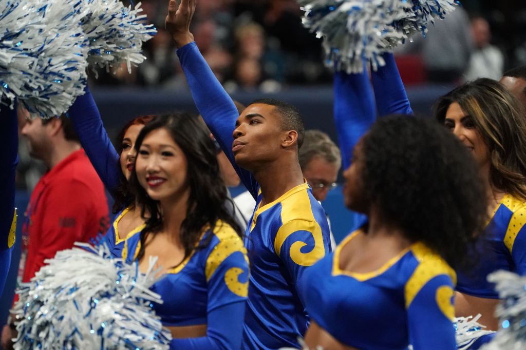 Rams cheerleader Napoleon Jinnies performs with other cheerleaders during Super Bowl LIII between the New England Patriots and the Los Angeles Rams at Mercedes-Benz Stadium in Atlanta, Georgia, on February 3, 2019