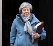 British Prime Minister Theresa May leaves 10 Downing Street to attend the weekly Prime Ministers Questions on January 9, 2019 in London, England.