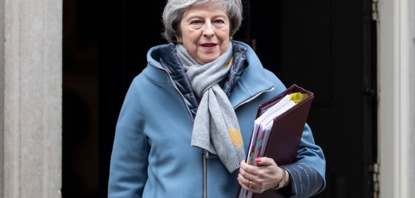 British Prime Minister Theresa May leaves 10 Downing Street to attend the weekly Prime Ministers Questions on January 9, 2019 in London, England.