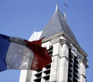 A French flag flying outside of a church