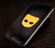 Lebanon Grindr ban: A phone on a table with the Grindr app switched on
