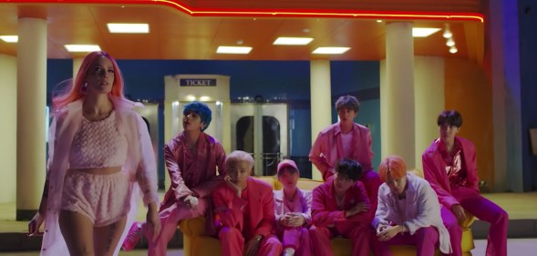 BTS and Halsey in a still from the teaser trailer for "Boys With Luv," the title track of new album Map of the Soul: Persona.