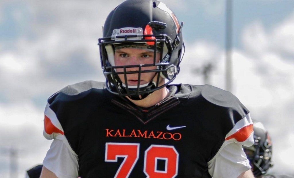 A photo of Christian Zeitvogelplaying football for Michigan’s Kalamazoo College in the US